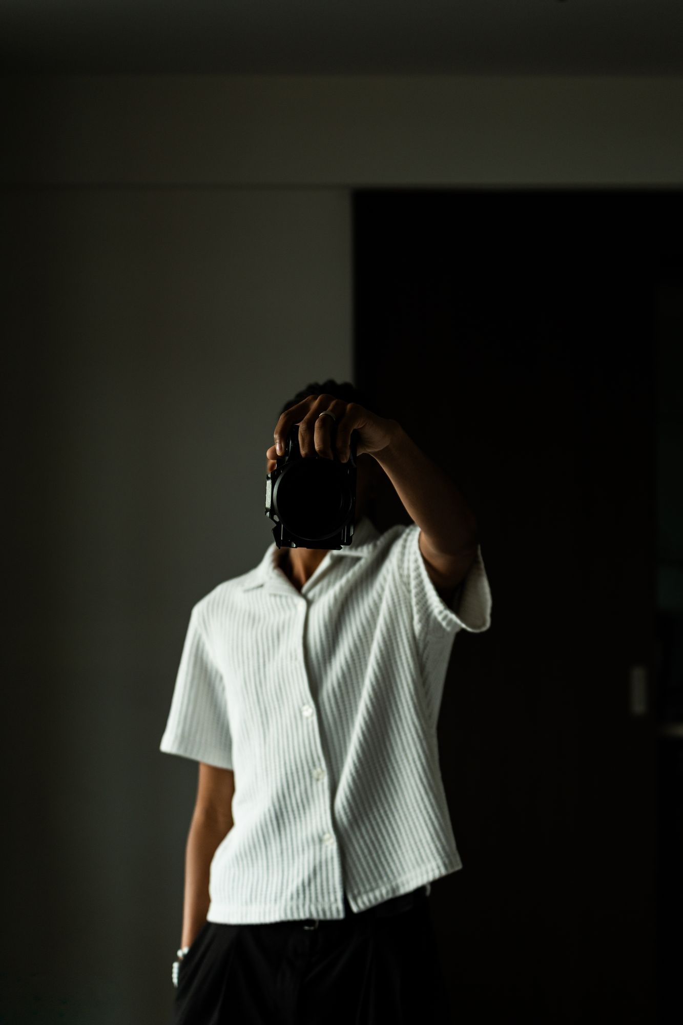 Angelo Vaughn, camera raised, San Diego
